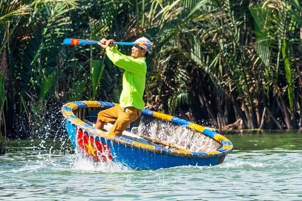 Traditional basket boats among coconut palms in Hoi An