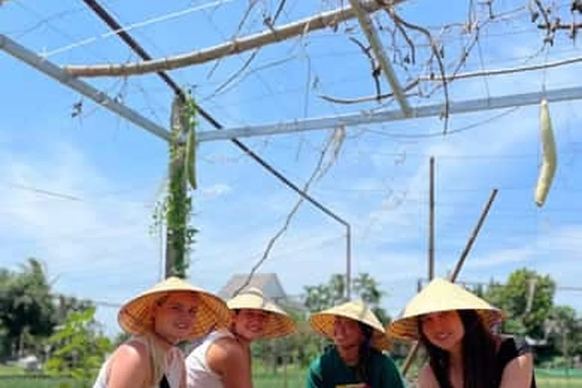 Cooking class surrounded by organic produce at Tra Que in Hoi An
